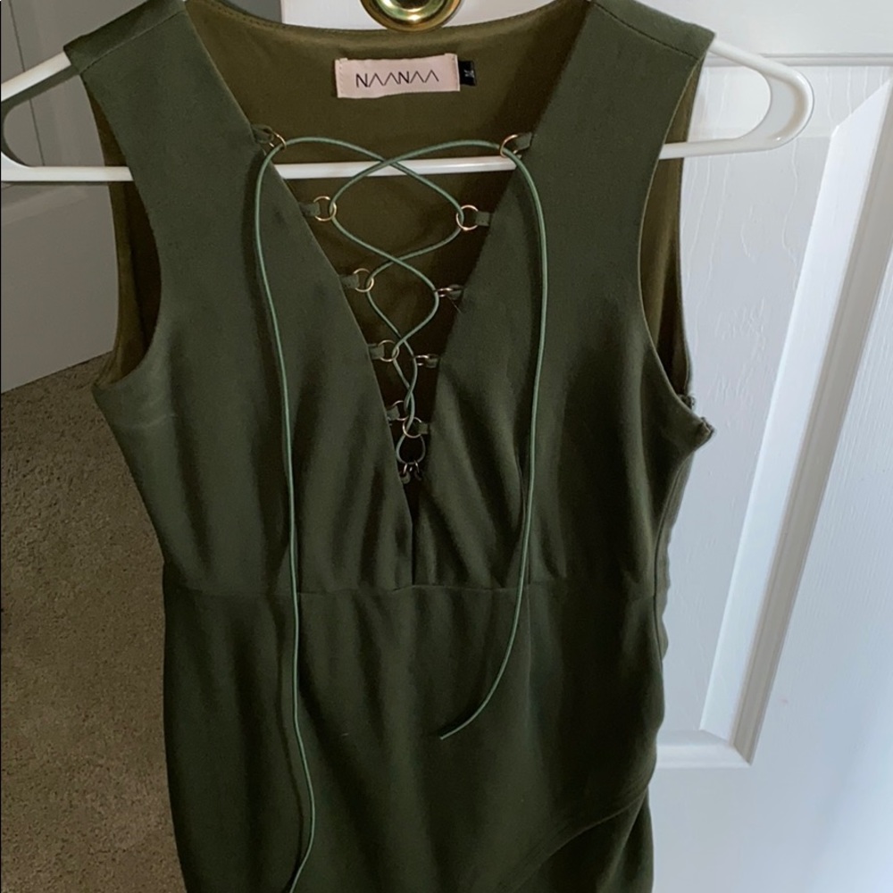 Asymmetrical Lace up body con dress.